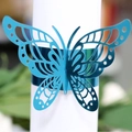 Eleganter blauer Schmetterling Serviettenring mit Hohlmuster und Metallic-Finish für Hochzeiten - Reflektierendes Blau