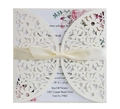 Elegant hollow-out floral wedding invitation with cream envelope and pink ribbon bow - Ivory