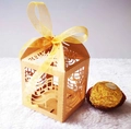 Laser-cut music note paper candy box in gold finish with yellow silk ribbon bow - Gold