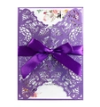Detailed laser-cut purple wedding invitation featuring floral print and satin ribbon bow - Dark Purple