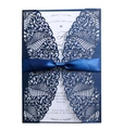 Detailed laser cut navy blue wedding invitation with elegant satin ribbon bow and insert - Magic Blue