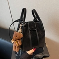 Black bucket bag in matte leather with white stitching and cute teddy bear charm - With Charm / Black