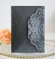 Detail of laser-cut lace pattern on dark grey matte wedding invitation cards - Charcoal Black