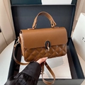 Caramel brown vintage crossbody bag with diamond quilting and gold twist-lock closure - Brown