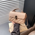 Elegant beige quilted handbag with diamond stitching and black-gold metal twist lock - Khaki