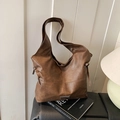 Dark brown retro leather tote bag in hobo style with drawstring and metal logo plate - Brown