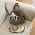 Detail of elephant grey leather bucket bag with plush rabbit charm and gold buckle - Grey (With Pendant)