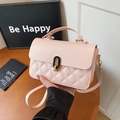 Pale pink quilted crossbody bag with stylish gold turn-lock and adjustable strap - Pink