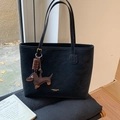 Black large tote bag in matte suede finish featuring a cute dachshund and chocolate charm - Black with Pendant
