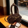 Dark brown retro shell handbag with gold hardware in suede and smooth leather - Brown