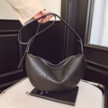 Chic black crescent shoulder bag in textured leather with adjustable strap and top zip - Gray