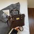 Deep brown vintage leather handbag for women featuring gold rivets and shoulder strap - Coffee No Charm