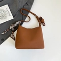 Brown bucket bag in pebble leather with printed scarf detail and adjustable strap - Brown (With Pendant)