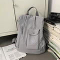 Minimalist light grey high-capacity backpack for commuting with textured fabric - Gray