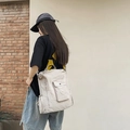 Versatile cream multifunctional backpack with multiple pockets for travel and leisure - Off White