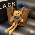 Brown leather tote bag featuring a cute long-legged teddy bear with Noisy Teddy detail - Brown