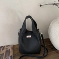 Classic black pebbled leather bucket bag with silver twist-lock and elegant top handles - No Pendant / Black