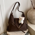 Dark brown canvas crossbody tote bag with retro buckle strap and plush cat charm - Coffee with Pendant
