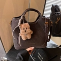 Dark brown suede bucket bag with top handle and cute plush dog charm accessory - Coffee with Pendant