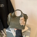 Olive green matte leather tote bag with gold lettering and a brown plush bear charm - Wilted Leaf Green With Pendant