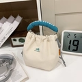 Nylon Beuteltasche in Off-White mit türkis gepolstertem Griff und orangefarbenem Label - Weiß mit Blau