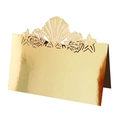 Detail of laser-cut gold wedding place card with seashell and starfish hollow design - Reflective Gold