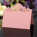 Pink laser-cut table card with shell and starfish patterns for weddings and parties - Pink