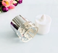 Silver metal Christmas candle holder with hollow reindeer and snowflake patterns and LED tea light - Reflective Silver
