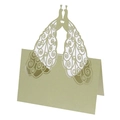 Close-up of laser-cut peacock place card with intricate patterns for wedding table - Emerald Green