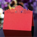 Red folding place card with laser-cut shell and starfish patterns for wedding tables - Red
