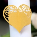 Servilletero de corazón en oro mate con intrincados motivos florales calados a láser - Dorado