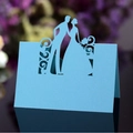 Light blue laser cut wedding place card featuring bride and groom silhouette design - Tiffany Blue