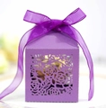 Detail showing laser-cut rose patterns and purple organza ribbon on square gift box - Dark Purple