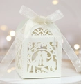 Detailed laser-cut candy box with romantic silhouette and elegant white ribbon bow - Ivory