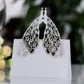 Elegant white laser-cut peacock place cards made of pearl paper for wedding table decor - White