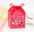 Detailed laser-cut rose pattern on red wedding candy box with a matching silk ribbon bow - Pearlescent Red
