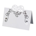 White laser cut heart wedding place cards with floral patterns for elegant table seating - White