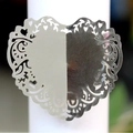 Silver laser-cut heart napkin ring with floral vine pattern for wedding decor - Reflective Silver
