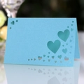 Light blue laser-cut heart place card in pearlescent paper for weddings and events - Tiffany Blue