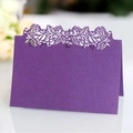 Deep purple laser-cut wedding place card with intricate floral镂空 patterns on pearlescent paper - Dark Purple