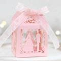 Pink laser cut wedding favor box with romantic groom and bride silhouette and ribbon bow - Pink