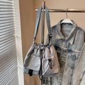 Gray-blue drawstring nylon crossbody bag with front pocket and adjustable strap - Blue Without Charm