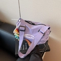 Purple nylon dumpling bag with adjustable strap and cute cartoon doll pendant - With Charm / Purple