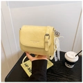 Detail of light yellow wrinkled leather crossbody bag with pearl heart charm - With Charm / Yellow
