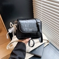 Black cracked-texture crossbody bag with pearl lace bow charm in minimalist style - Black with Pendant