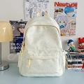 Cream canvas backpack featuring blue star patterns and white drawstring side pockets - Blue Star Without Pendant
