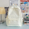 Off-white canvas backpack with green star prints and drawstring side pockets for students - Green Star Without Pendant