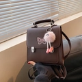 Brown leather multiway backpack with pink butterfly embroidery and plush charm - Coffee With Pendant