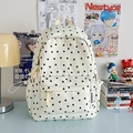 Creamy white backpack with black star pattern featuring front pocket and drawstring side pockets - Black Star Without Pendant