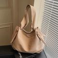 Minimalist apricot PU leather tote bag with soft cloud texture and knotted strap detail - Khaki